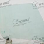 LH FRONT DOOR GLASS GREEN